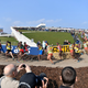 Competitors in the men’s senior race come off the museum roof into a hairpin turn. Photo: Lars Moller